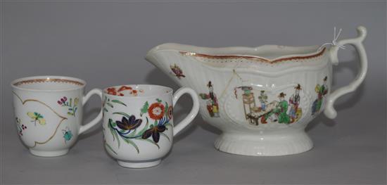 A group of Worcester polychrome wares, comprising a sauceboat with a Kempthrone cup and another cup